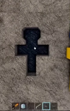 Inserting a cross-shaped relic into the wall