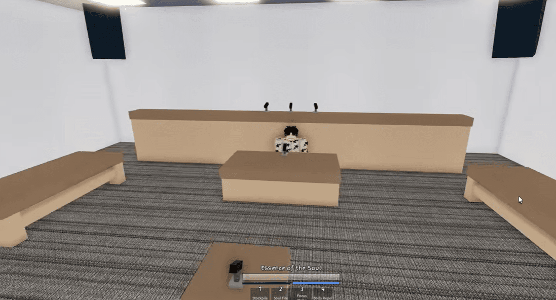 The interior of the new courtroom building with wooden benches and a podium