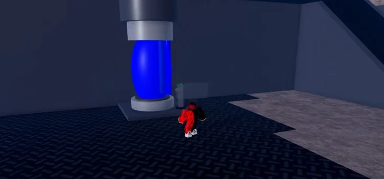 Player interacting with the blue machine console inside the facility.