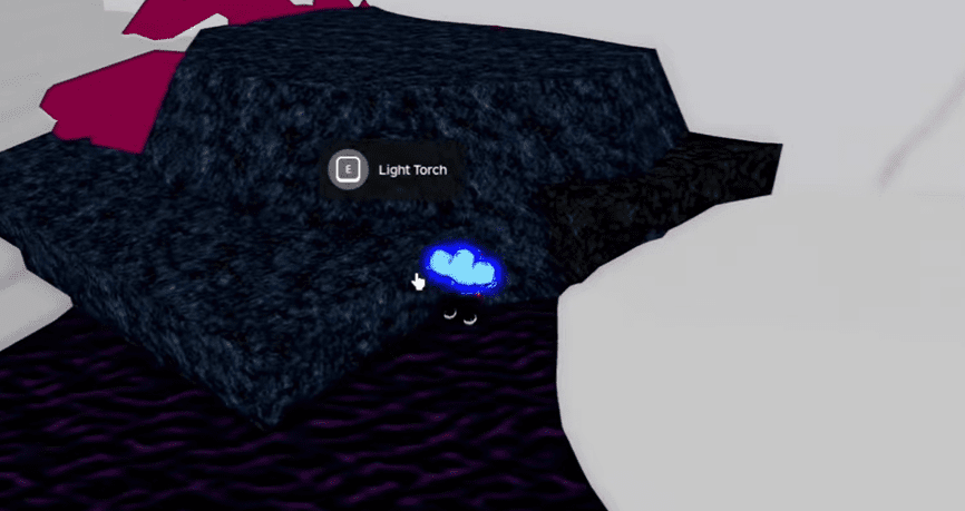 The player lighting a torch inside the white-colored Heaven Dimension