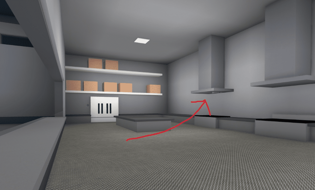 prison kitchen area with a red arrow pointing up into the industrial exhaust fan