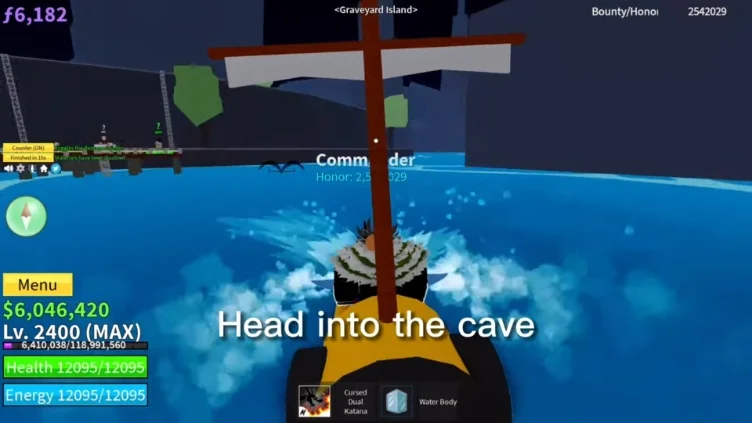 A player character moving towards the entrance of a dark cave on the island.